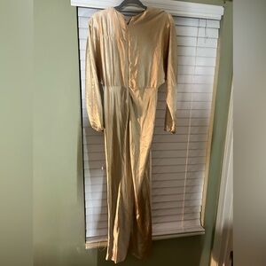 Golden tan I think .. never wore brand new . Got it from a modest brand